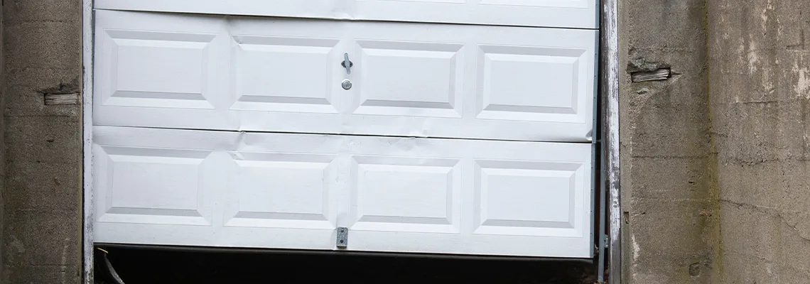 Garage Door Got Hit By A Car Dent Removal in Woodridge, IL